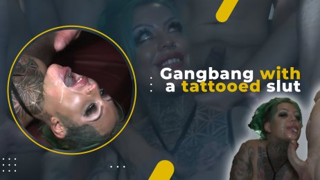 Gangbang on a tattooed slut