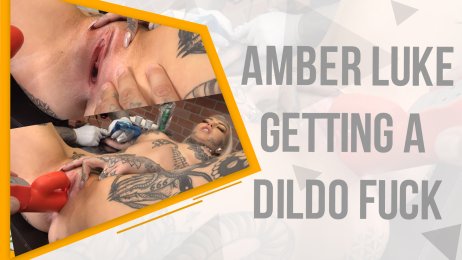 Amber Luke getting dildo fuck while having an arm tattoo